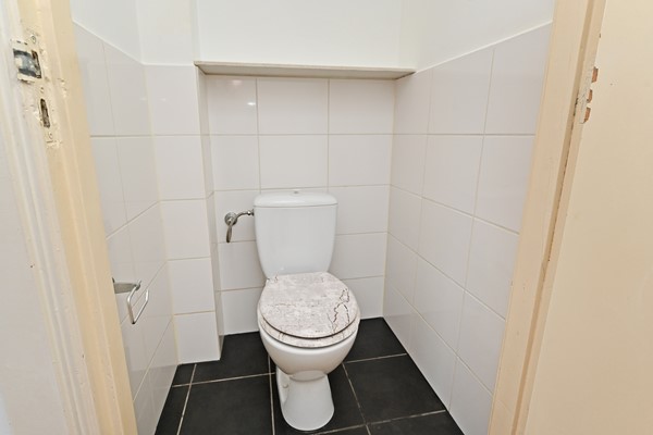 Medium property photo - Deimanstraat 309, 2522 BK Den Haag